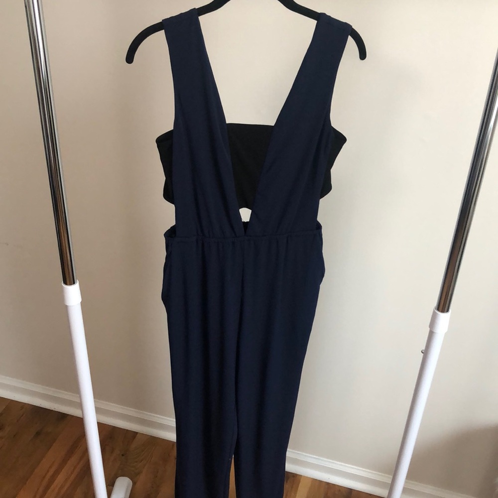 BCBGeneration jumpsuit in navy & black. SMALL